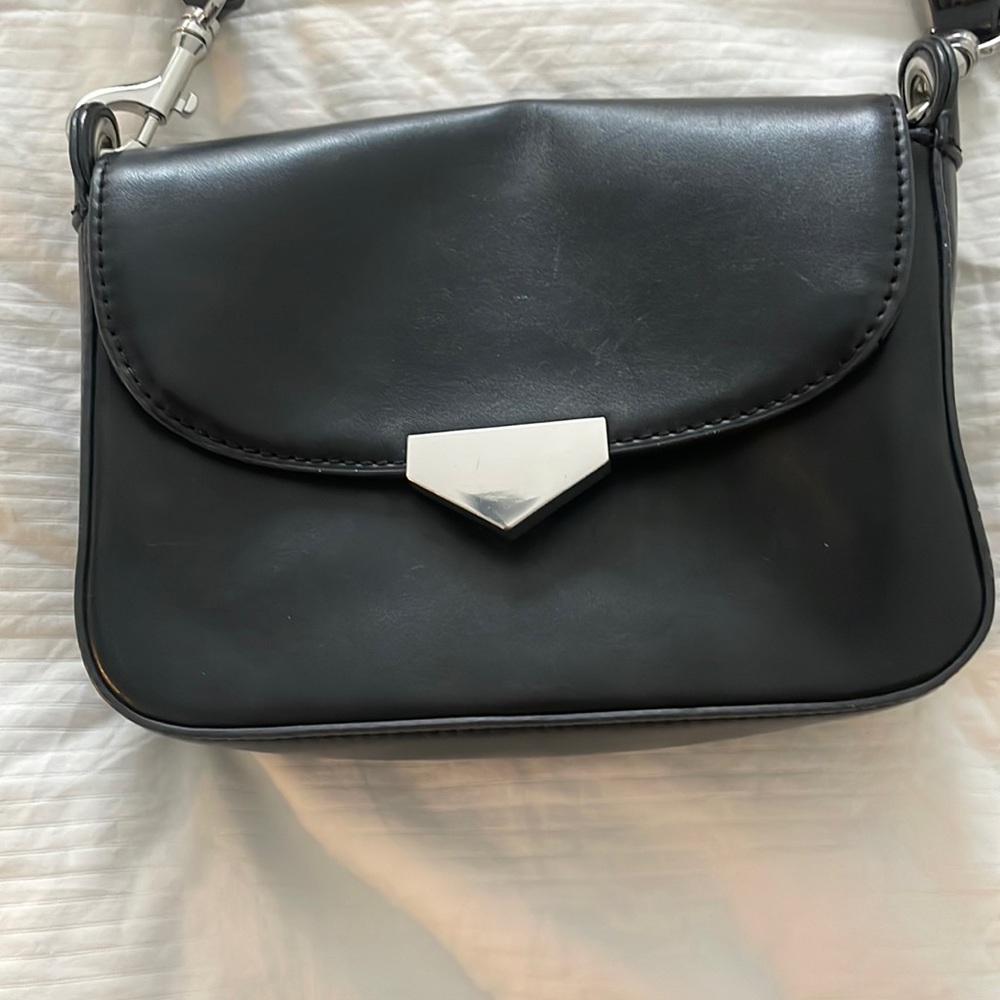 INC black crossbody bag-small pocket inside. Pocket outside back of purse